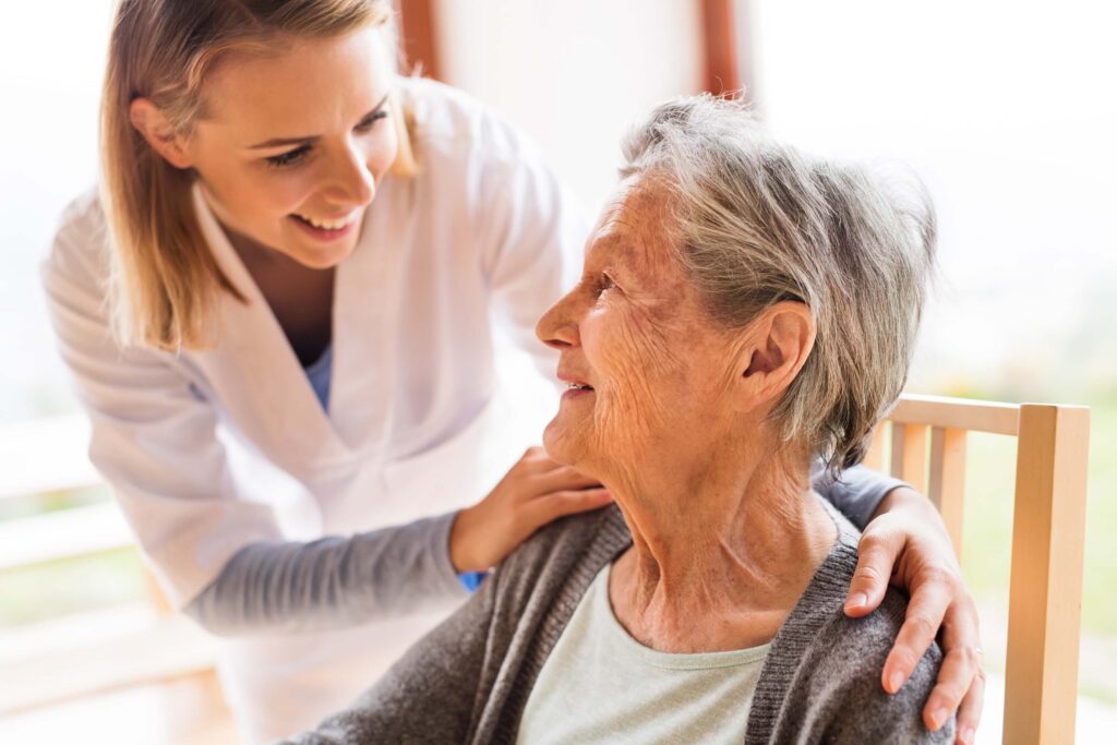 Health visitor and elderly woman