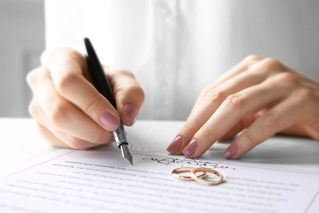 Woman signs marriage contract